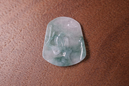 Natural Jade Pendant with Carved Bird Design