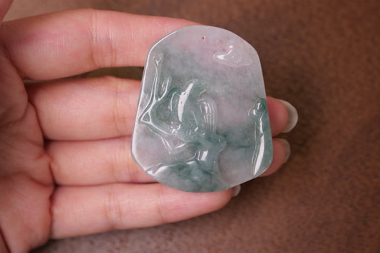 Natural Jade Pendant with Carved Bird Design