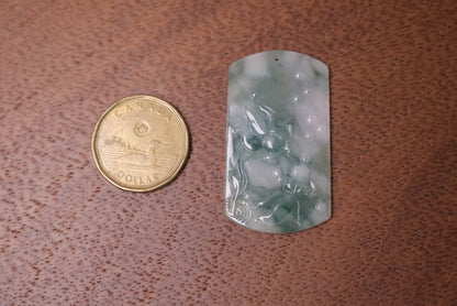 Natural Jade Pendant with Carved Fish Design