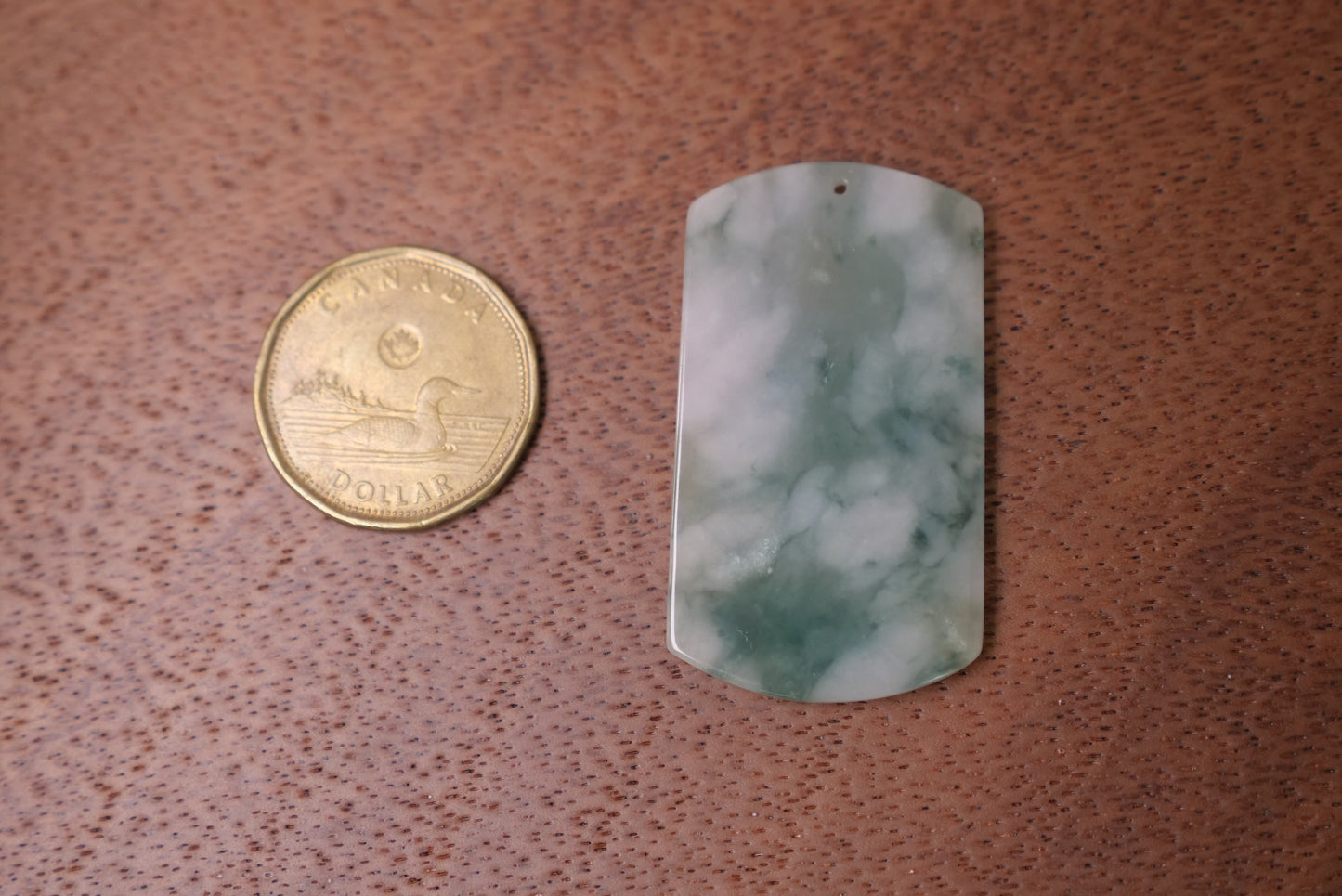 Natural Jade Pendant with Carved Fish Design