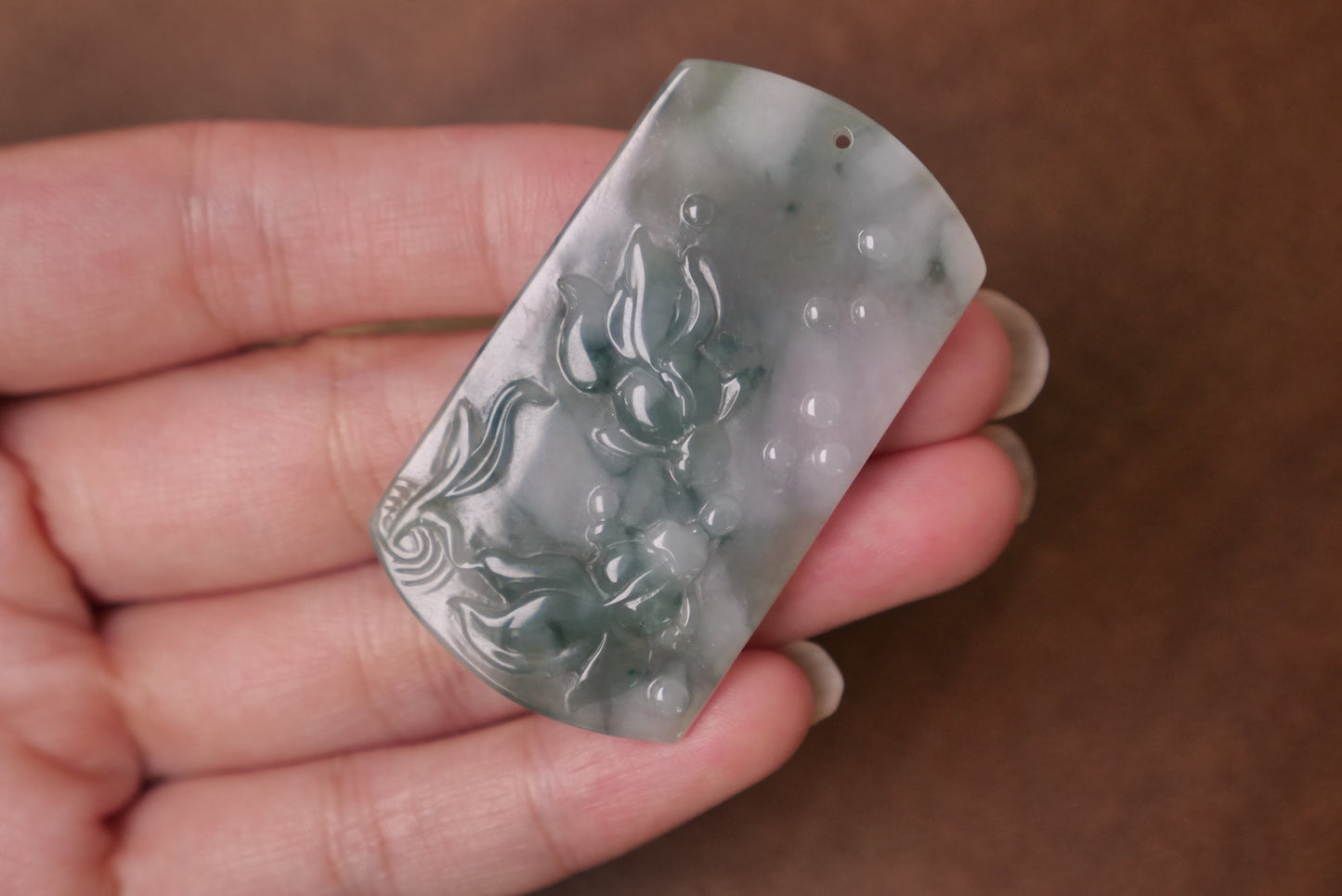 Natural Jade Pendant with Carved Fish Design