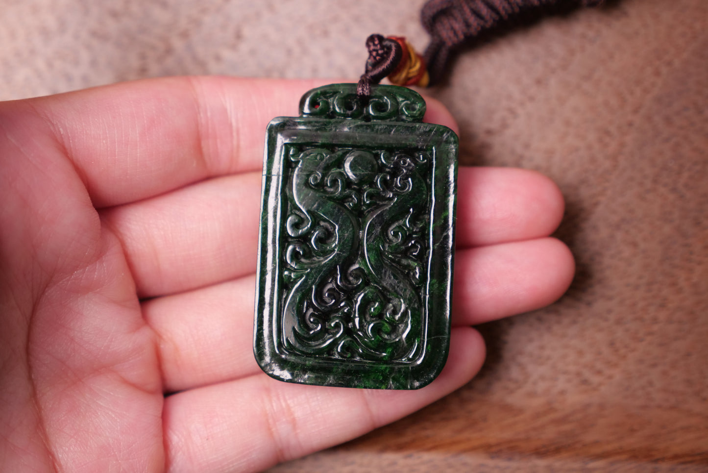 Dark Green Jade Pendant: Hand-Carved Dragon and Phoenix Design