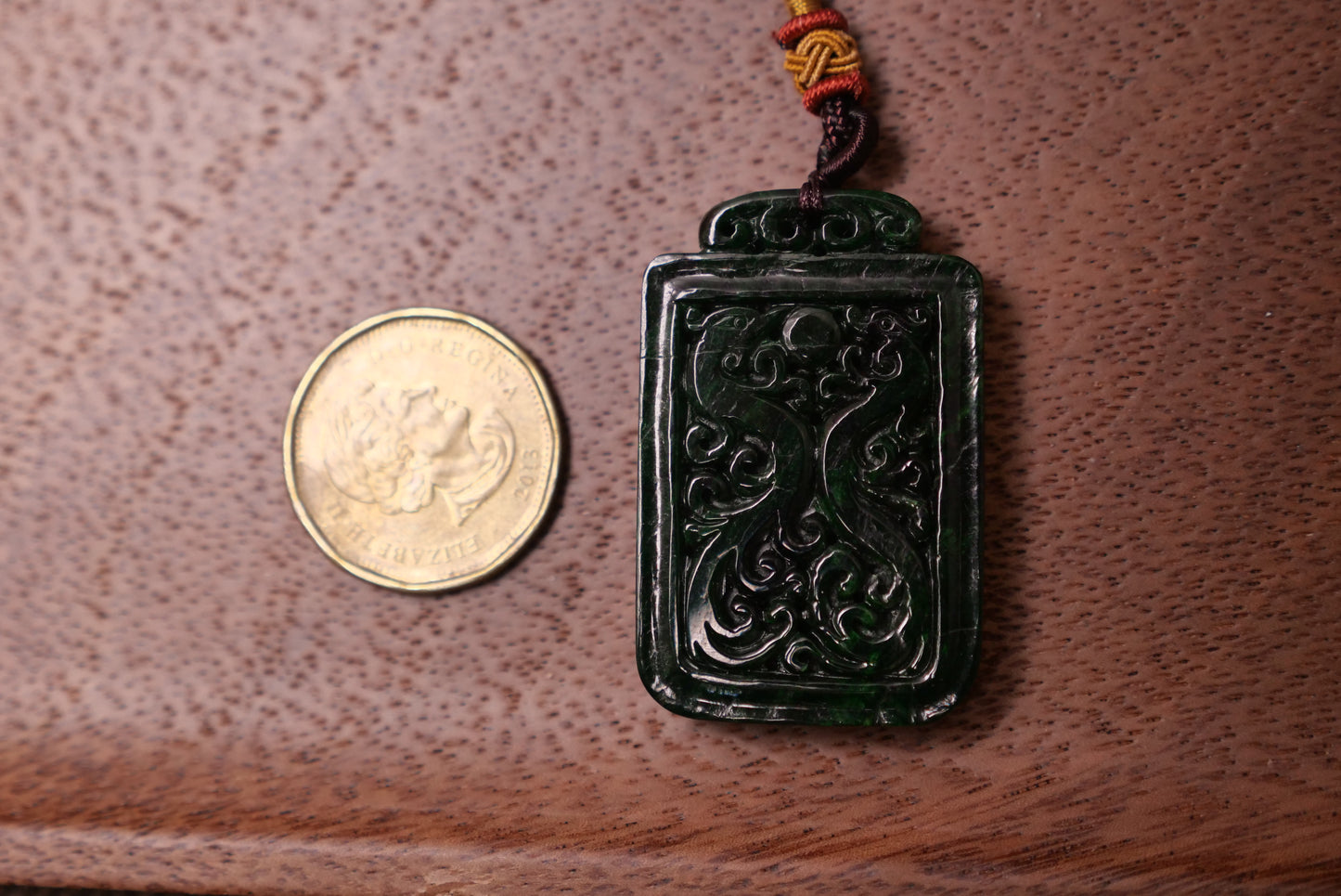 Dark Green Jade Pendant: Hand-Carved Dragon and Phoenix Design