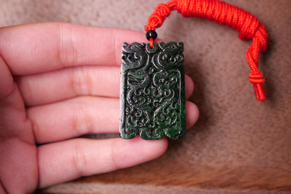 Double Dragon Design: Dark Green Jade Pendant