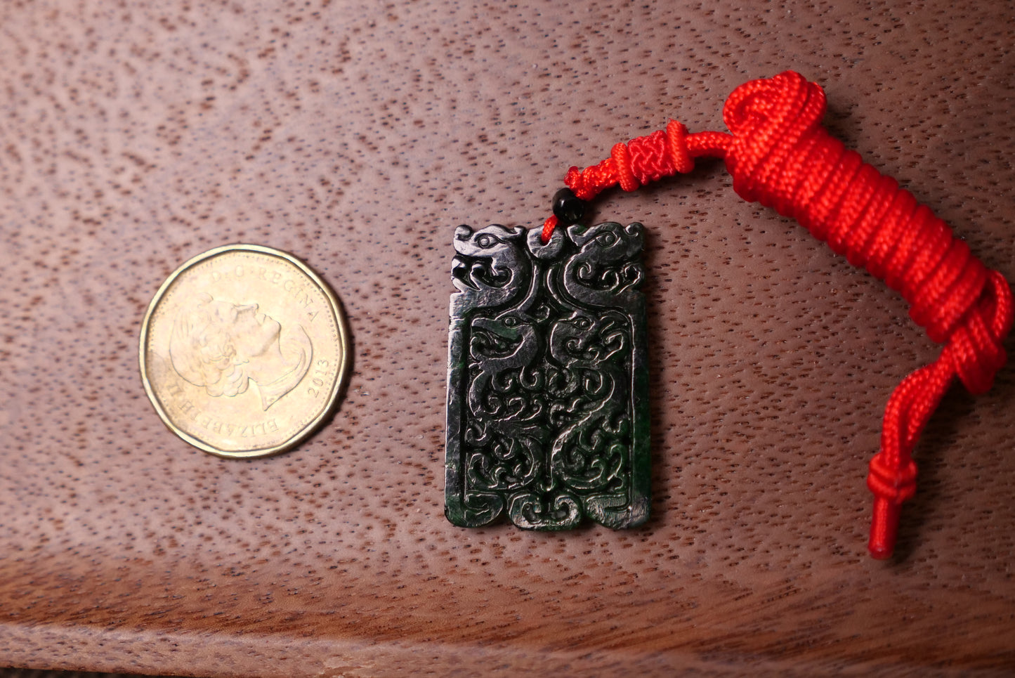 Double Dragon Design: Dark Green Jade Pendant