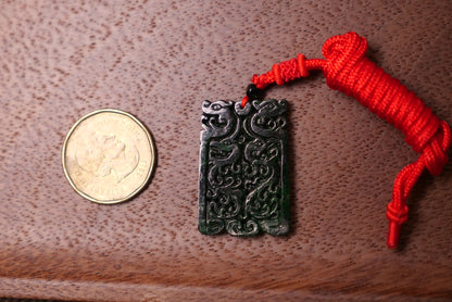 Double Dragon Design: Dark Green Jade Pendant