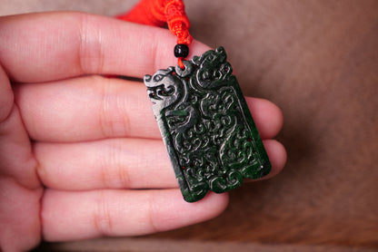 Double Dragon Design: Dark Green Jade Pendant