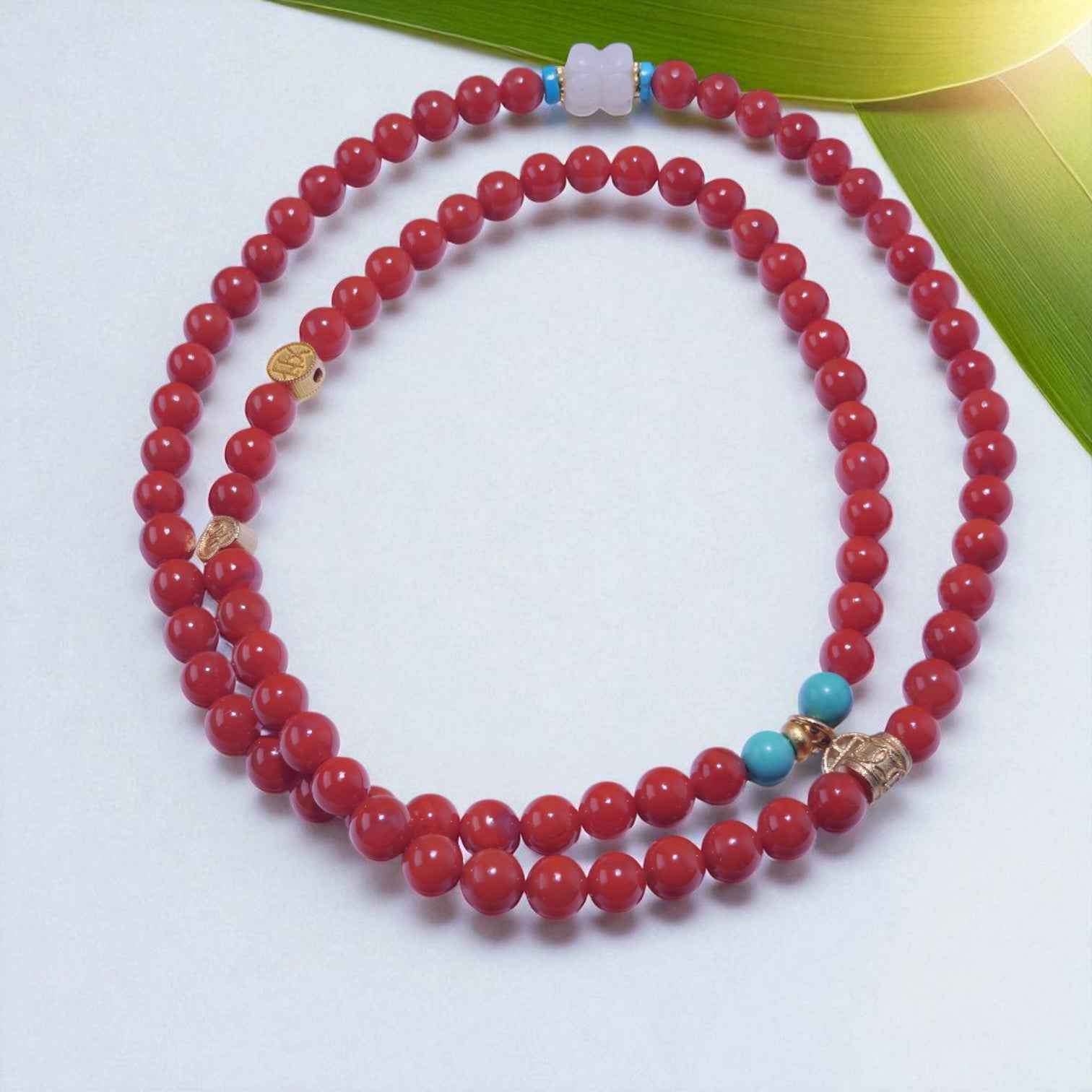 Ignite the Spirit – South Red Agate Mala with Turquoise Accents & White Jade Charm